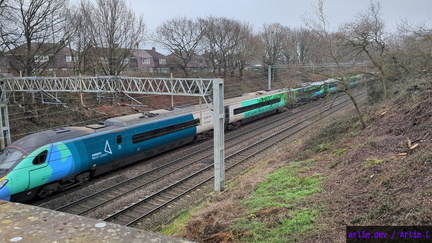PXL 20251222 AWC Class 390 passing Madeley Foot Bridge125209708