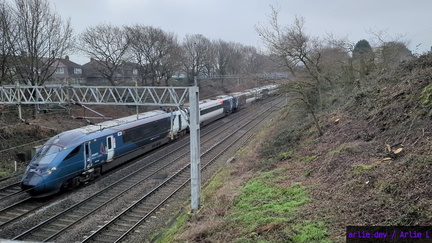 AWC Class 807 passing Madeley Foot Bridge
